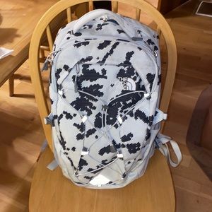 Unisex White and dark grey speckled print north face backpack